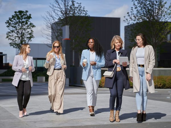 Professional Women Discussing Business in Financial District