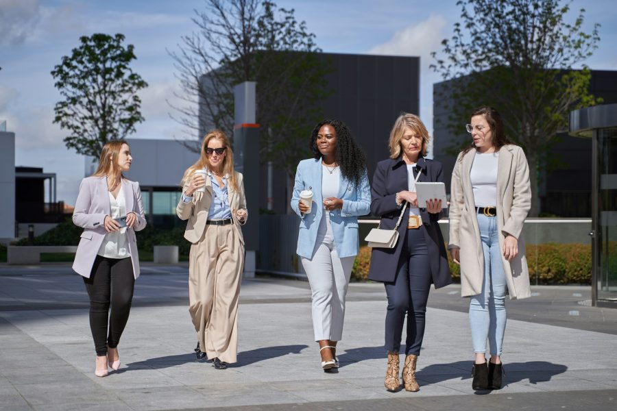 Professional Women Discussing Business in Financial District