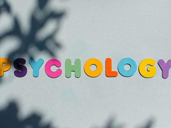 Psychology word multicolored wooden letters.