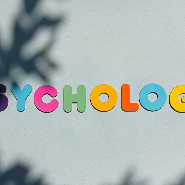 Psychology word multicolored wooden letters.